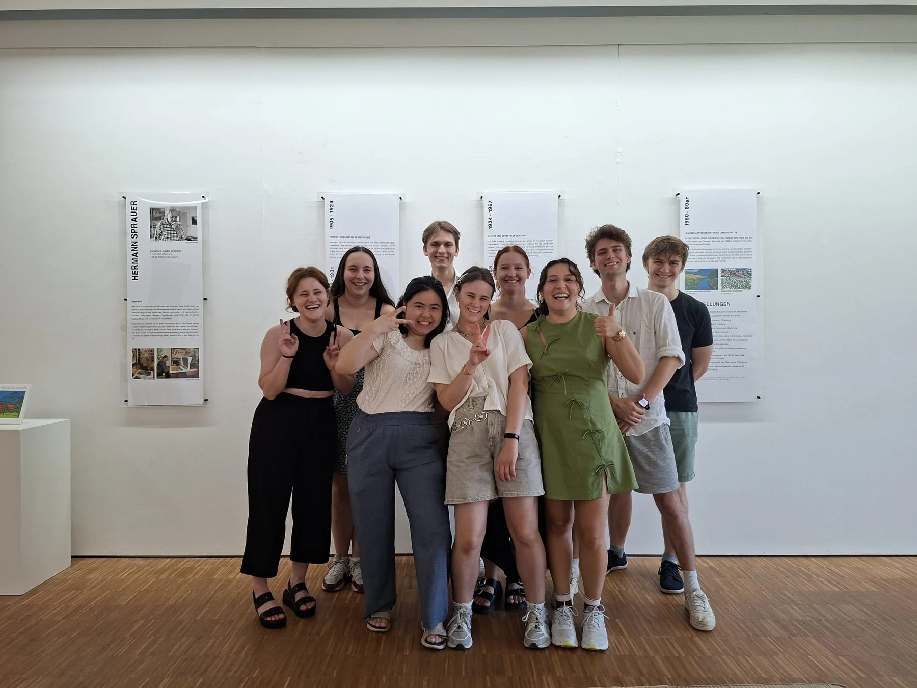 The Hermann Sprauer exhibition team in front of the exhibition display